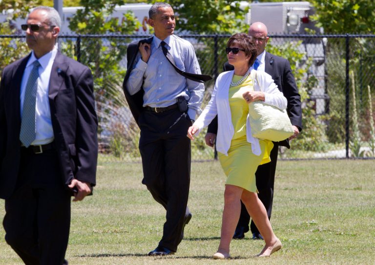 President Barack Obama walks with senior adviser Valerie Jarrett as he leaves a fundraising event in Los Altos Hills, Calif., Wednesday, July 23, 2014. (AP Photo)