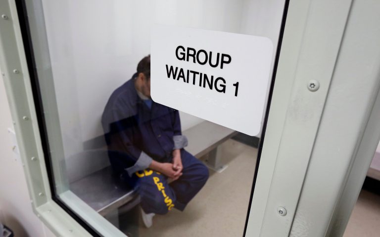 FILE- In this Feb. 14, 2013 file photo, an inmate waits for his appointment in a holding room at new mental health treatment unit at the California Medical Facility in Vacaville, Calif. Two members of the Council On Mentally Ill Offenders, an obscure council within the Department of Corrections and Rehabilitation's, said the council can not meet its obligations because it has lacked an executive director for more than two years. (AP Photo/Rich Pedroncelli, File)