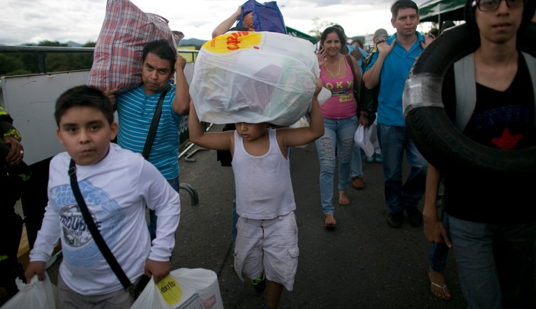 One ideology is better than the other. (AP Photo/Ariana Cubillos)