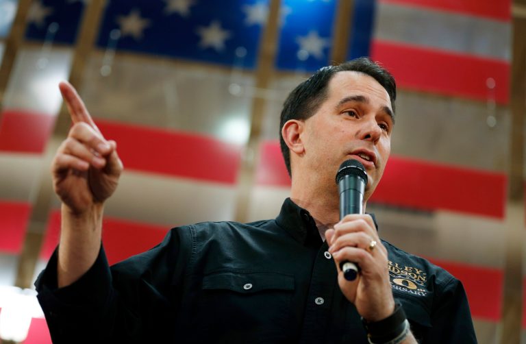 In this July 14, 2015 file photo, Wisconsin Gov. Scott Walker speaks during a campaign event in Las Vegas. The Club for Growth appears to view Walker mostly favorably, but expressed some lingering concerns. (AP Photo/John Locher)