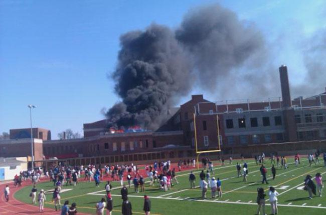 Firefighters battle blaze on roof of Anacostia High School