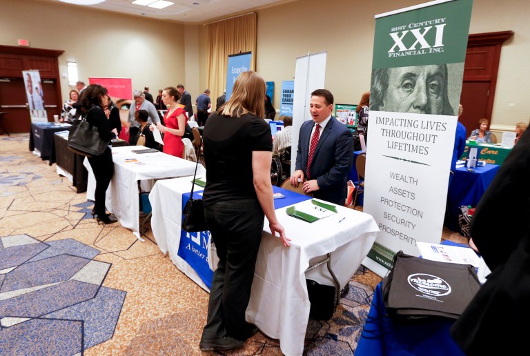 Business forecasters had expected jobless claims to ease back down to around 254,000. (AP Photo/Keith Srakocic)