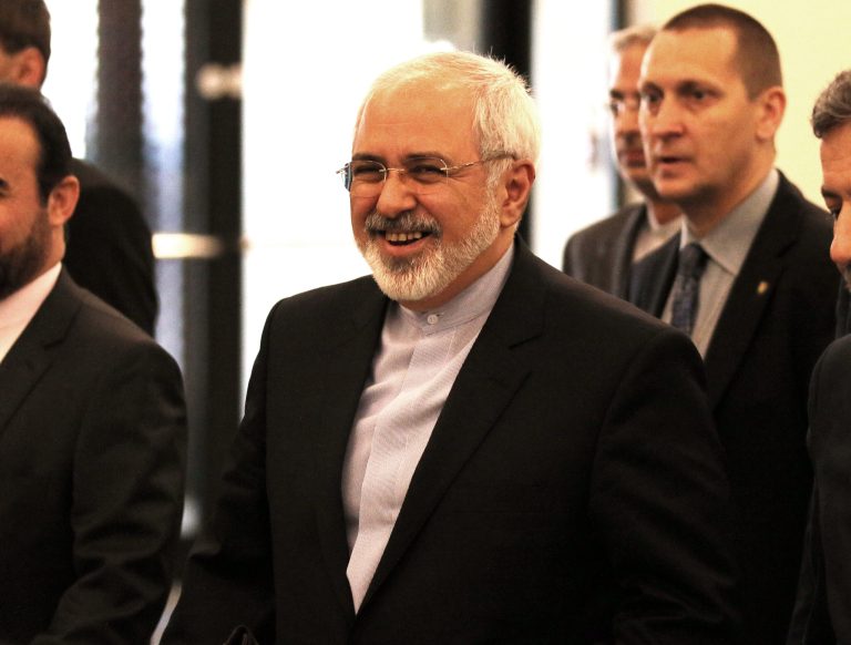 Iranian Foreign Minister Mohammad Javad Zarif arrives for the start of closed-door nuclear talks with European foreign policy chief Catherine Ashton in Vienna, Austria, Tuesday, June 17, 2014. (AP Photo/Ronald Zak)