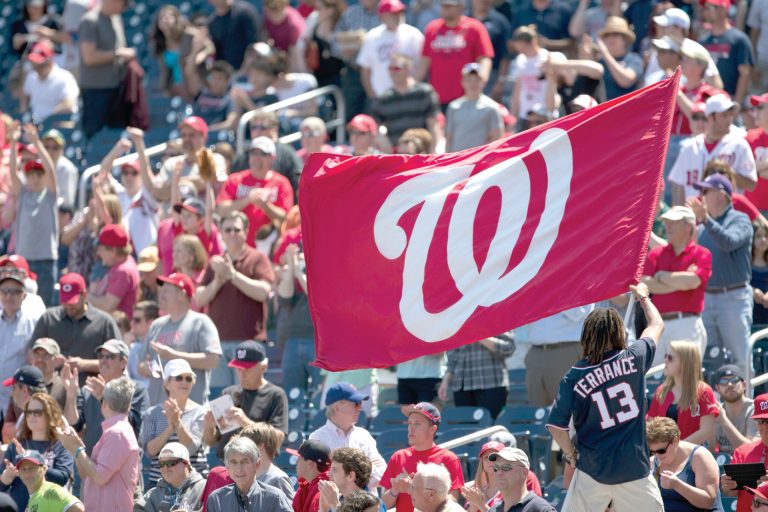 Evan Vucci/AP
Nationals fans include people who are both pro- and anti-wave, and the groups are becoming increasingly hostile toward each other.