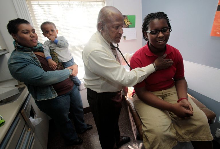 The U.S. uninsured rate fell to 9 percent during the first half of this year,Â according to aÂ CDC report released Thursday.Â (AP Photo/Marcio Jose Sanchez)