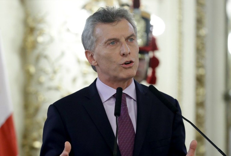 Argentine President Mauricio Macri categorically denied a report circulated by the Democratic National Committee on Monday in which an Argentine journalist accused President-elect Trump of discussing his private business interests during a phone call last week. (AP Photo/Natacha Pisarenko)
