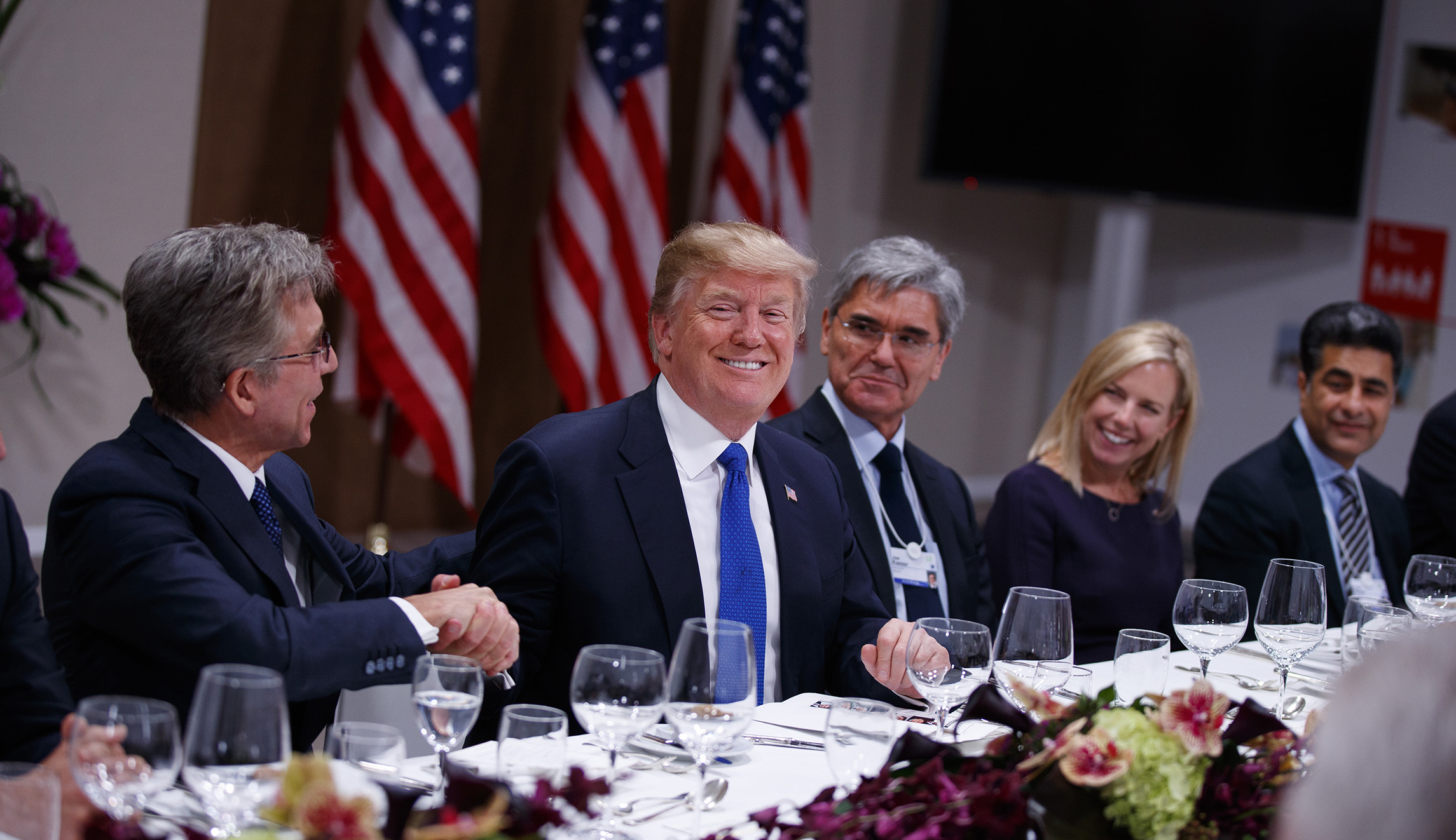 Trump attracts big energy investment, tax reform admirers in Davos