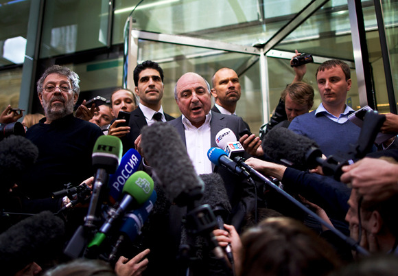 Russian oligarch Boris Berezovsky (C) addresses the media outside London's High Court in central London, on August 31, 2012. Berezovsky lost his long-running battle in London High Court with fellow tycoon Roman Abramovich on Friday. Berezovsky, 66, was seeking more than ÃÂ£3 billion ($4.75 billion, 3.8 billion euros) in damages after accusing the 45-year-old owner of Chelsea football club of blackmail, breach of trust and breach of contract. AFP PHOTO / ANDREW COWIE        (Photo credit should read ANDREW COWIE/AFP/GettyImages)