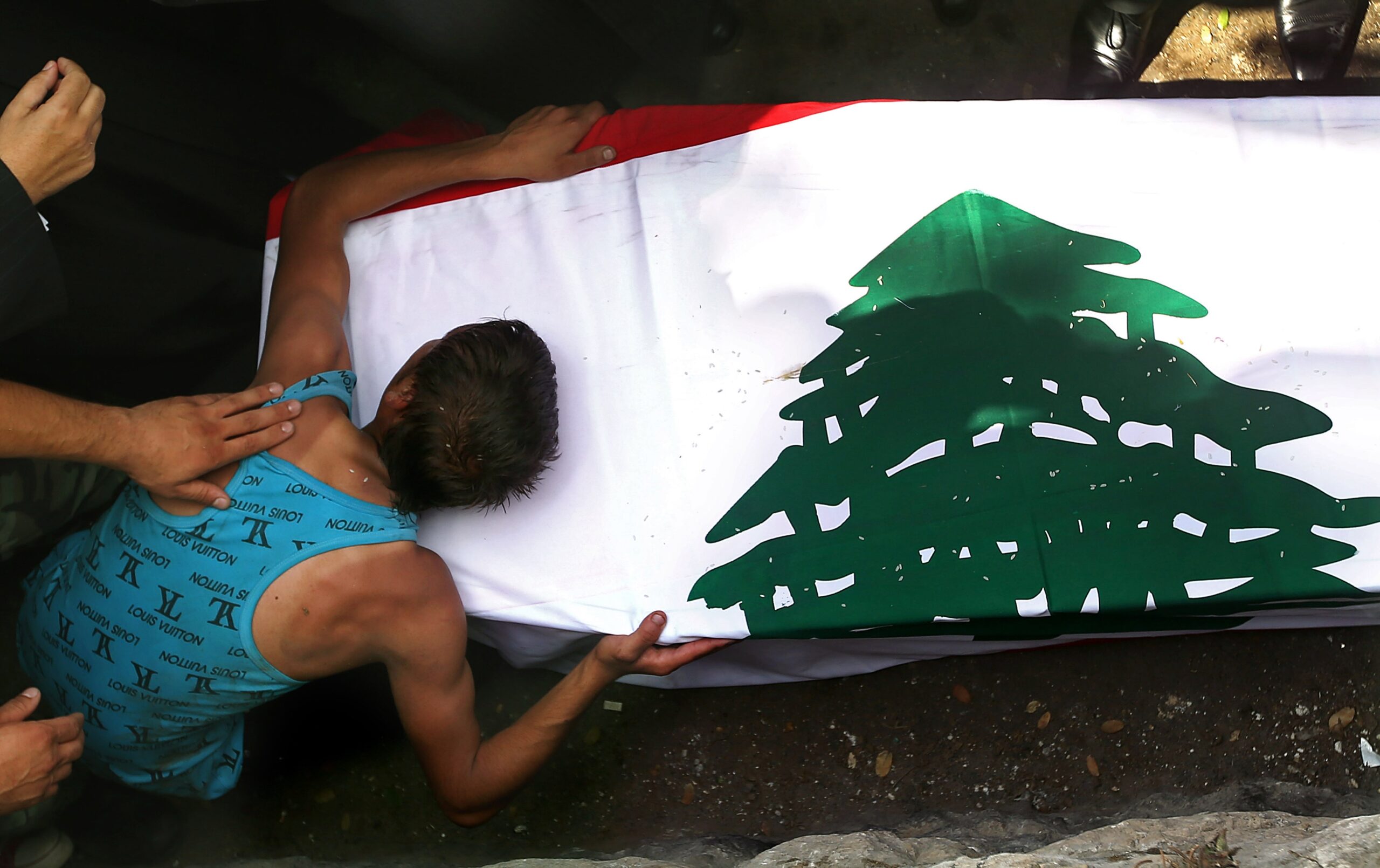 Anger as decapitated Lebanese soldier is buried