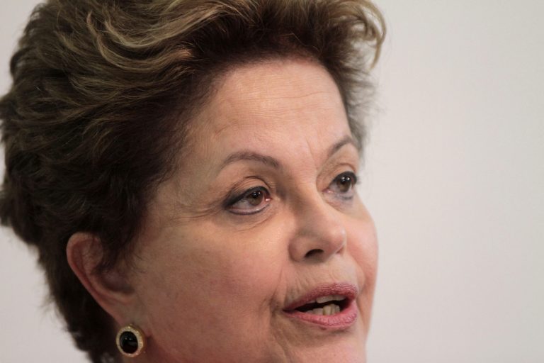 FILE - In this July 1, 2013 file photo, Brazil's President Dilma Rousseff gives a news conference in Brasilia, Brazil. Rousseff's popularity has dipped five percentage points ahead of October's presidential elections, according to a poll published by the Folha de S. Paulo newspaper on Sunday, April 6, 2014. Datafolha attributed the drop in Rousseff's popularity to rising inflation and fears of unemployment and lower purchasing power. (AP Photo/Eraldo Peres, File)