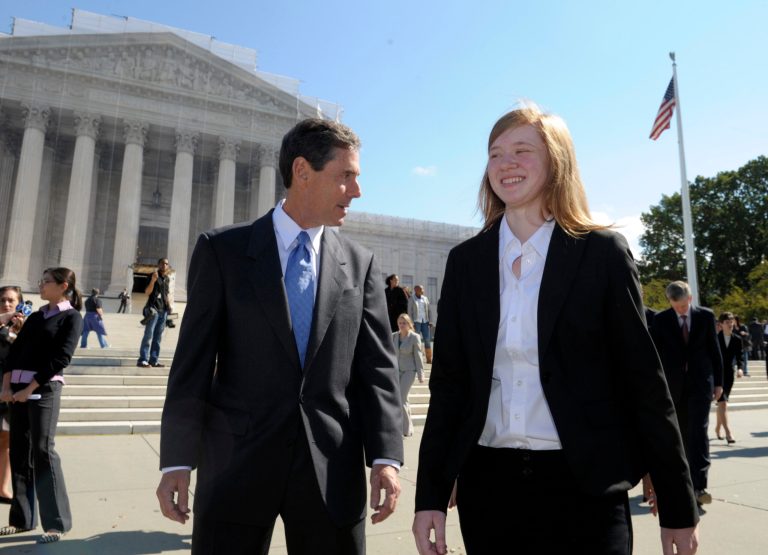 Abigail Fisher, the Texan involved in the University of Texas affirmative action case, and Edward Blum, who runs a group working to end affirmative action, walk outside the Supreme Court in Washington, Wednesday, Oct. 10, 2012. (AP Photo)Â 