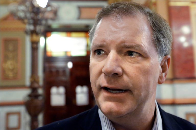 Illinois state Sen. Bill Brady, a Republican gubernatorial candidate in 2014, speaks with reporters at the state Capitol in Springfield, Ill., on Tuesday.