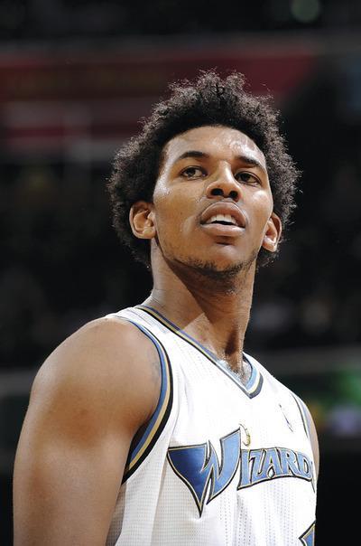 WASHINGTON, DC-DECEMBER 18: Nick Young#1 of the Washington Wizards rests during a break in the game against the Miami Heat at the Verizon Center on December 18, 2010 in Washington, DC. NOTE TO USER: User expressly acknowledges and agrees that, by downloading and or using this Photograph, user is consenting to the terms and conditions of the Getty Images License Agreement.(Photo by Greg Fiume/Getty Images)***Local Caption***Nick Young