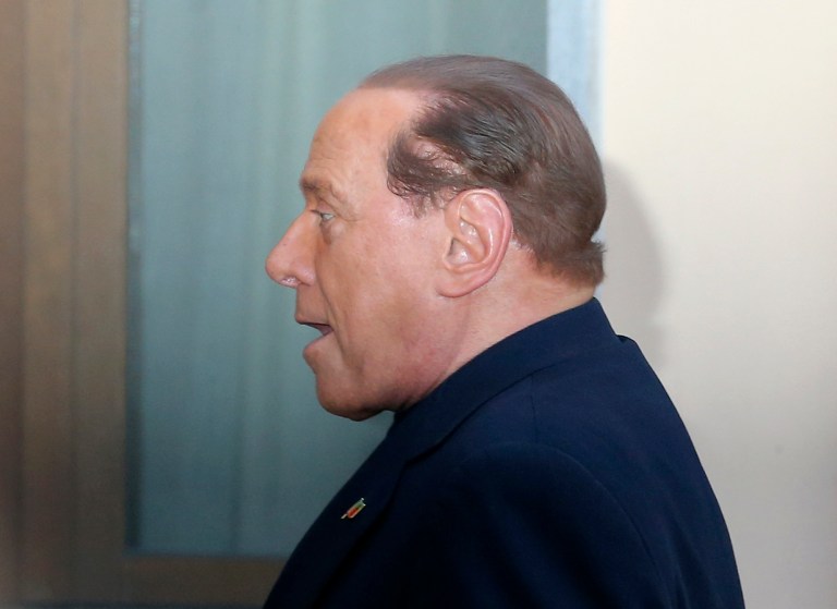 Former Italian premier Silvio Berlusconi arrives at the 