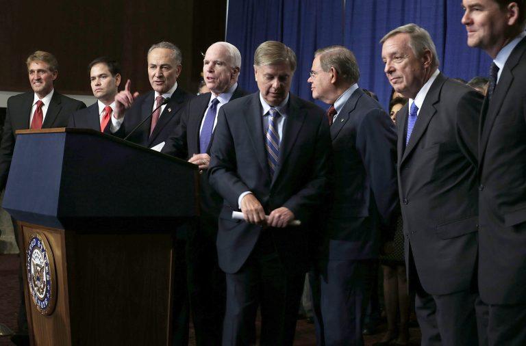 (L-R) U.S. Sen. Jeff Flake (R-AZ), Sen. Marco Rubio (R-FL), Sen. Charles Schumer (D-NY), Sen. John McCain (R-AZ), Sen. Lindsey Graham (R-SC), Sen. Bob Menendez (D-NJ), Sen. Richard Durbin (D-IL), and Sen. Michael Bennet (D-CO), also known as the Gang of Eight. Four GOP members of the gang â Sens. John McCain and Jeff Flake, both of Arizona, Lindsey Graham, of South Carolina and Marco Rubio of Florida â voted against the fence and visa amendments. (Photo: Alex Wong/Getty Images)