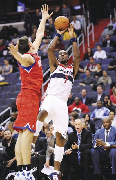 Nick Wass/AP
After the regular season opening loss to the Nets, Wizards forward Andray Blatche complained about his role on offense.