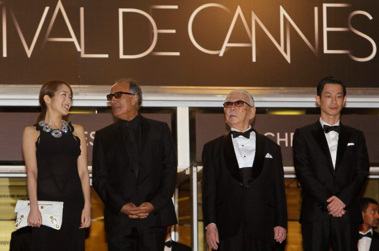 From left, actress Rin Takanashi, director Abbas Kiarostami, actors Tadashi Okuno and Ryo Kase arrive for the screening of Like Someone in Love at the 65th international film festival, in Cannes, southern France, Monday, May 21, 2012. (AP Photo/Francois Mori)
