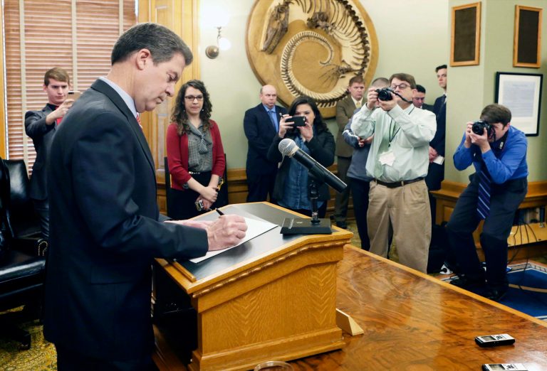 Brownback, who ran for president in 2008, is very unpopular halfway through his second term. (Thad Allton /The Topeka Capital-Journal via AP)