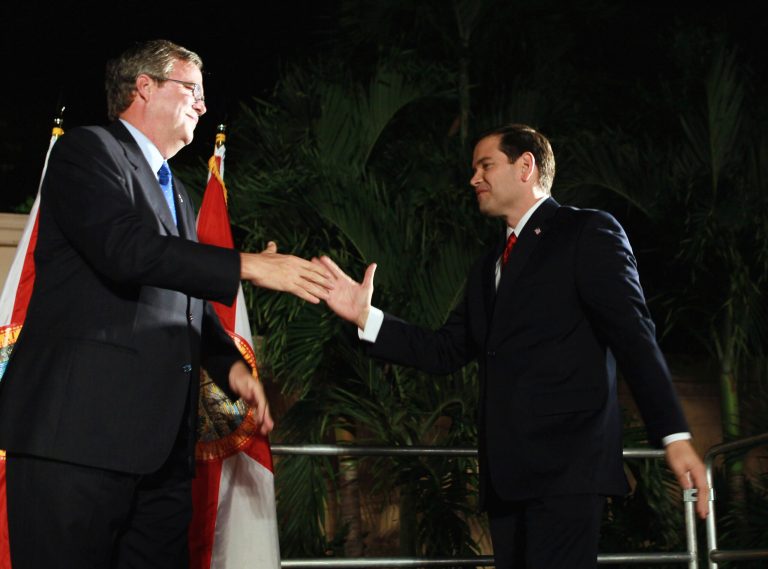 Sen. Marco Rubio, right, is greeted by former Gov. Jeb Bush during his 'Reclaim America Victory Celebration' at the Biltmore Hotel on November 2, 2010 in Coral Gables, Florida. (Photo by Joe Raedle/Getty Images)