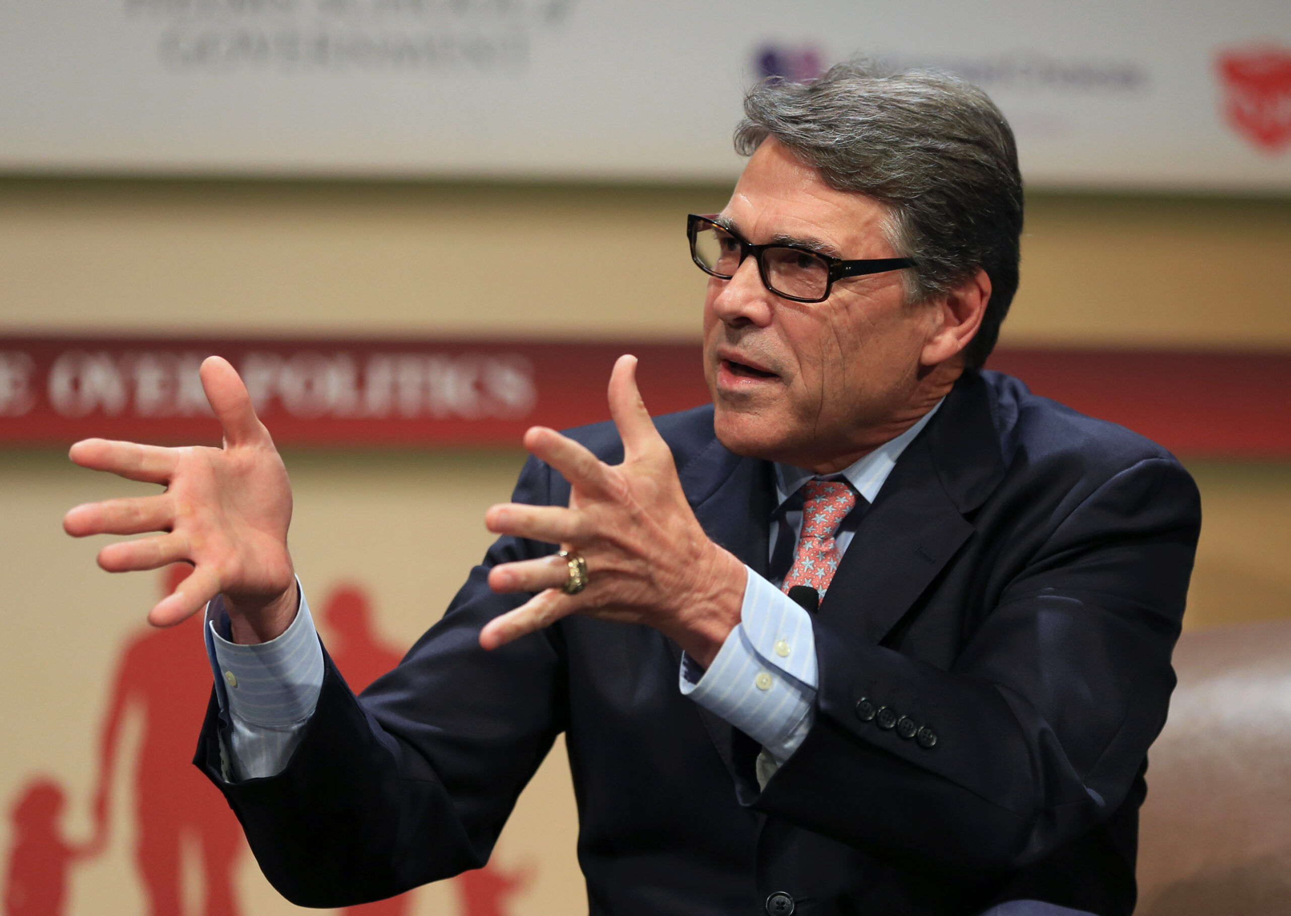 Court dismisses one charge against Rick Perry