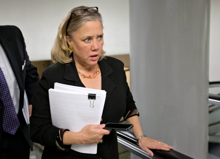 Sen. Mary Landrieu, D-La. rushes with other lawmakers to the Senate floor on Capitol Hill to vote on amendments to the budget resolution. (AP Photo/J. Scott Applewhite, File)