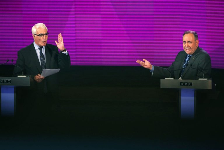 Better Together leader Alistair Darling, left, and Scotland's First Minister, Alex Salmond, both gesture whilst they take part in the second television debate over Scottish independence at Kelvingrove Art Gallery and Museum in Glasgow, Scotland, Monday Aug. 25, 2014. (AP Photo/PA, David Cheskin) UNITED KINGDOM OUT  NO SALES  NO ARCHIVE