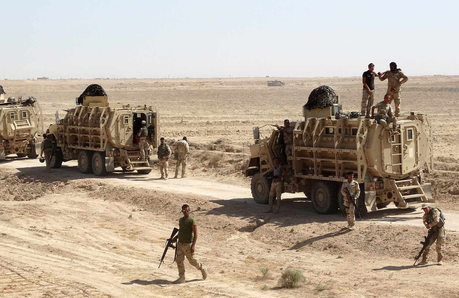 More U.S. troops to Iraq seen as tipping point, Pentagon sources say