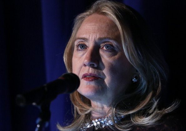 WASHINGTON, DC - NOVEMBER 08:  U.S. Secretary of State Hillary Clinton speaks during a ceremony to present a Common Ground Award to Anne Stevens, sister of the late U.S. Ambassador to Libya Christopher Stevens, at the Carnegie Institution for Science November 8, 2012 in Washington, DC. Anne Stevens accepted the award on behalf of her brother, who was killed in the assault on the U.S. consulate in Benghazi, Libya September 11, 2012.  (Photo by Alex Wong/Getty Images)