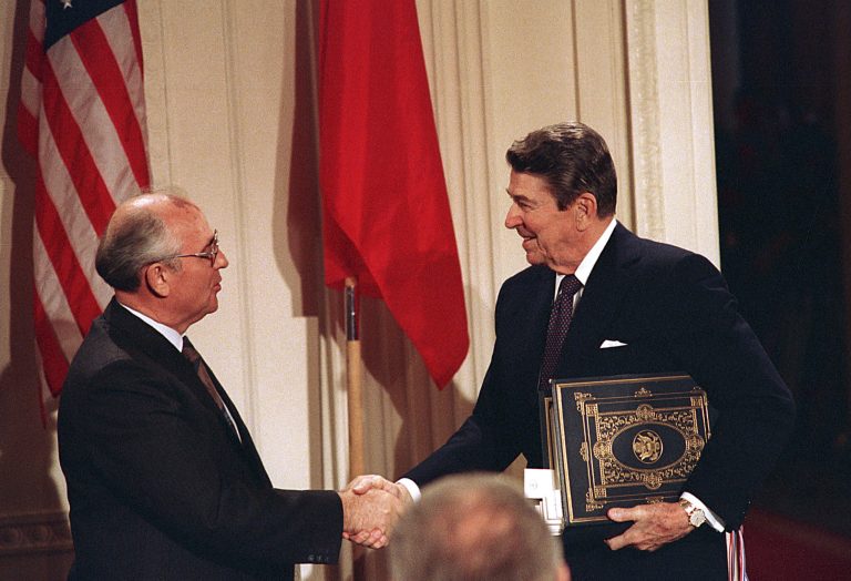 FILE - Int this Dec. 8, 1997, file photo, U.S. President Ronald Reagan, right, shakes hands with Soviet leader Mikhail Gorbachev after the two leaders signed the Intermediate Range Nuclear Forces Treaty to eliminate intermediate-range missiles during a ceremony in the White House East Room in Washington. In an escalation of tensions, the Obama administration accused Russia on July 28, 2014, of conducting tests in violation of a 1987 nuclear missile treaty, calling the breach 