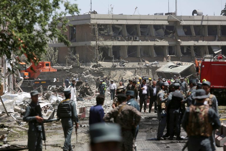 Security forces inspect the site of a suicide attack where German Embassy is located in Kabul, Afghanistan, on Wednesday. A massive explosion rocked a highly secure diplomatic area of Kabul on Wednesday morning, causing casualties and sending a huge plume of smoke over the Afghan capital. (AP photo)