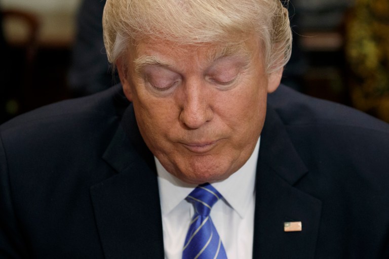 Institutions are assailing Trump and his young administration again and again, both for better and for worse. (AP Photo/Evan Vucci)