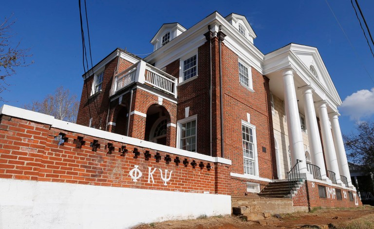 Three members of the Phi Kappa Psi fraternity argued in a lawsuit that family, friends and coworkers identified them as potential rapists from clues in the article. (AP Photo/Steve Helber, File)