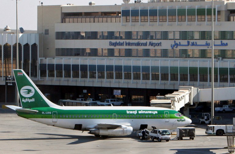 FILE - In this Dec. 28, 2005 file photo, an Iraqi Airways plane sits on the tarmac at Baghdad International Airport. European and Dubai-based airlines have begun rerouting flights over Iraqi airspace as a security precaution, though Iraq says its skies are safe. (AP Photo/Khalid Mohammed, File)
