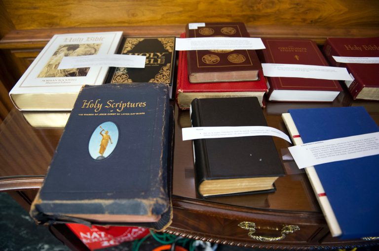 Religious books from the Library of Congress sit on a table awaiting mock swearing ceremonies for members of the House Representatives, Tuesday, Jan. 3, 2017, on Capitol Hill in Washington as the 115th Congress begins.