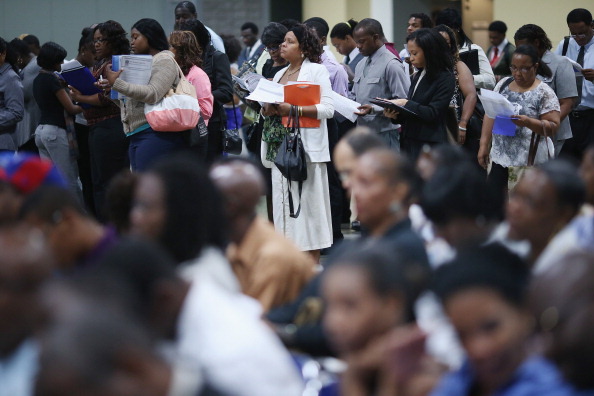 WASHINGTON, DC - AUGUST 23:  Residents of the District of Columbia participate in U.S. Congresswoman Eleanor Holmes Norton's 15th annual job fair at the Washington Convention Center August 23, 2012 in Washington, DC. (Photo by Chip Somodevilla/Getty Images)