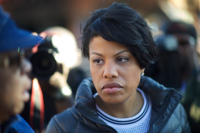 Baltimore mayor Stephanie Rawlings-Blake greets a concerned citizen the morning after citywide riots following the funeral of Freddie Gray, on April 28, 2015 in Baltimore, Md. (Photo by Mark Makela/Getty Images)