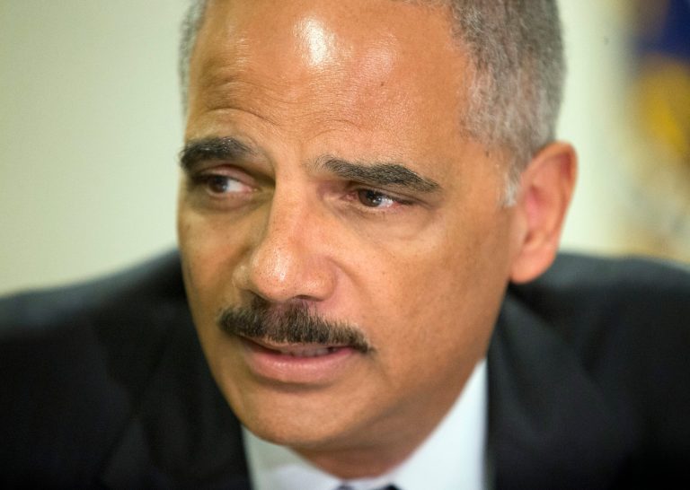Attorney General Eric Holder during his meeting at the FBI building in St. Louis, Wednesday, Aug. 20, 2014.  Holder has told Ferguson community leaders that he has assigned the federal government's 