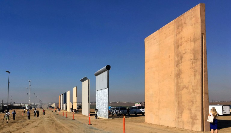 This 2017 file photo shows prototypes of border walls in San Diego, Calif. President Trump will visit the city on Tuesday to inspect them. (AP Photo/Elliott Spagat, File)