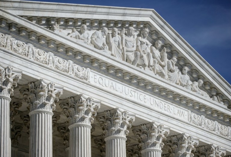 Even without the most conservative justice on the bench, the most likely scenario U.S. v. Texas is that the remaining Supreme Court justices split evenly, legal experts say. (AP Photo)