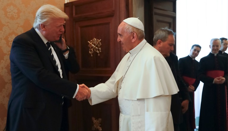 Pope Francis meets with President Trump on the occasion of their private audience, at the Vatican. Trump gave the pope a first-edition set of Martin Luther King Jr.'s writings on Wednesday. (AP Photo/Alessandra Tarantino, Pool)