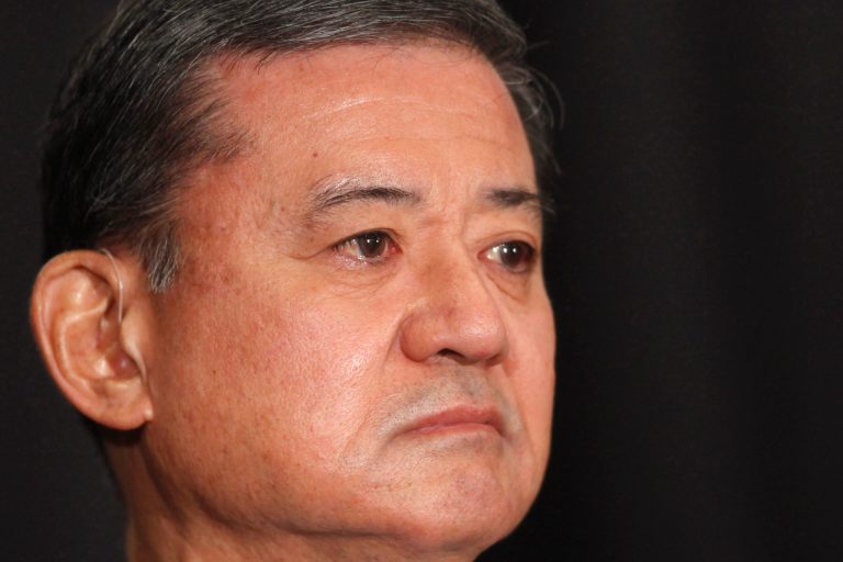 Veterans Affairs Secretary Eric Shinseki is seated before speaking at a meeting of the National Coalition for Homeless Veterans, Friday, May 30, 2014, in Washington. The president said Friday that Shinseki is resigning amid widespread troubles with veterans' health care.  (AP Photo/Charles Dharapak)