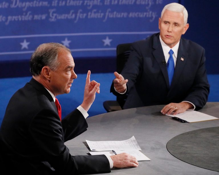 Republican vice-presidential nominee Gov. Mike Pence, right, and Democratic vice-presidential nominee Sen. Tim Kaine speak during the vice-presidential debate at Longwood University in Farmville, Va., Tuesday, Oct. 4, 2016. (Andrew Gombert/Pool via AP)