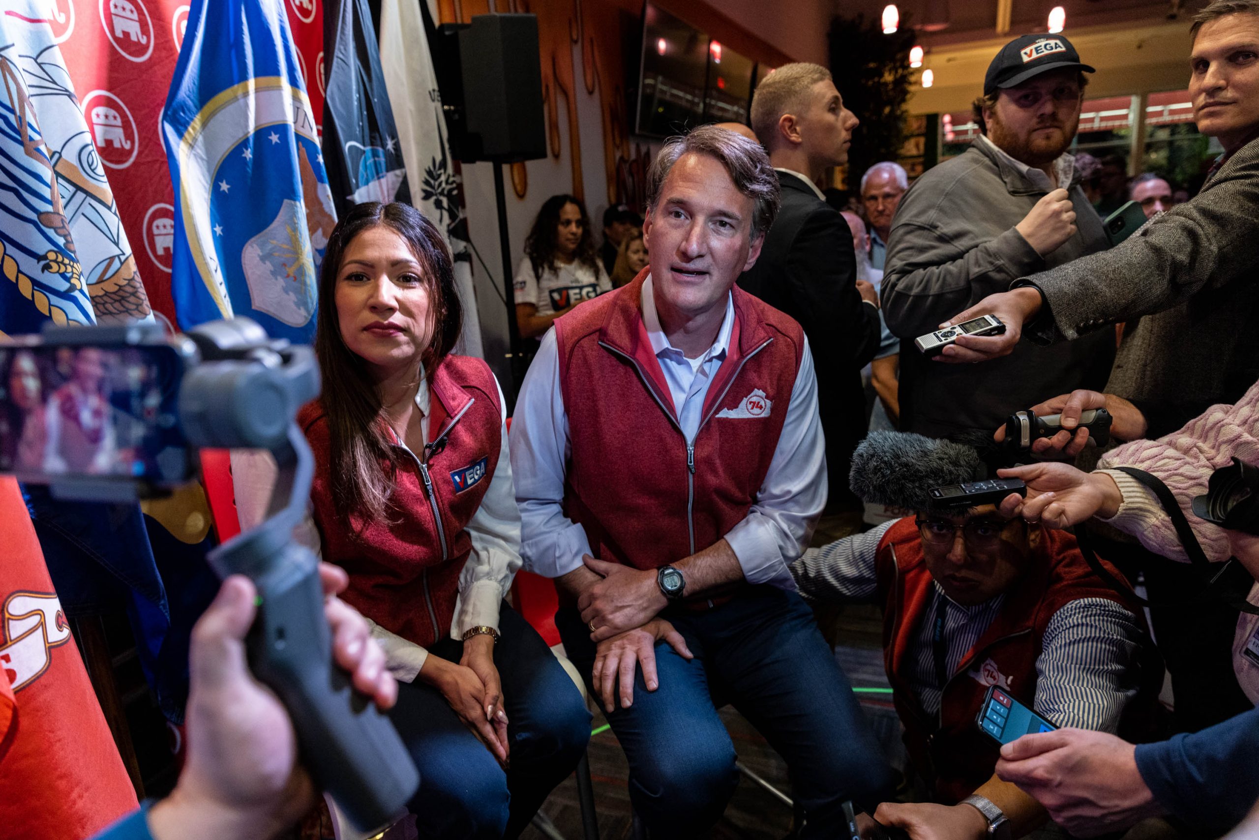 Yesli Vega, the Republican candidate for Virginia's 7th Congressional District, and Virginia Gov. Glenn Youngkin, take questions from media at a campaign rally in Fredericksburg, Virginia, Monday, Oct. 16, 2022. 
