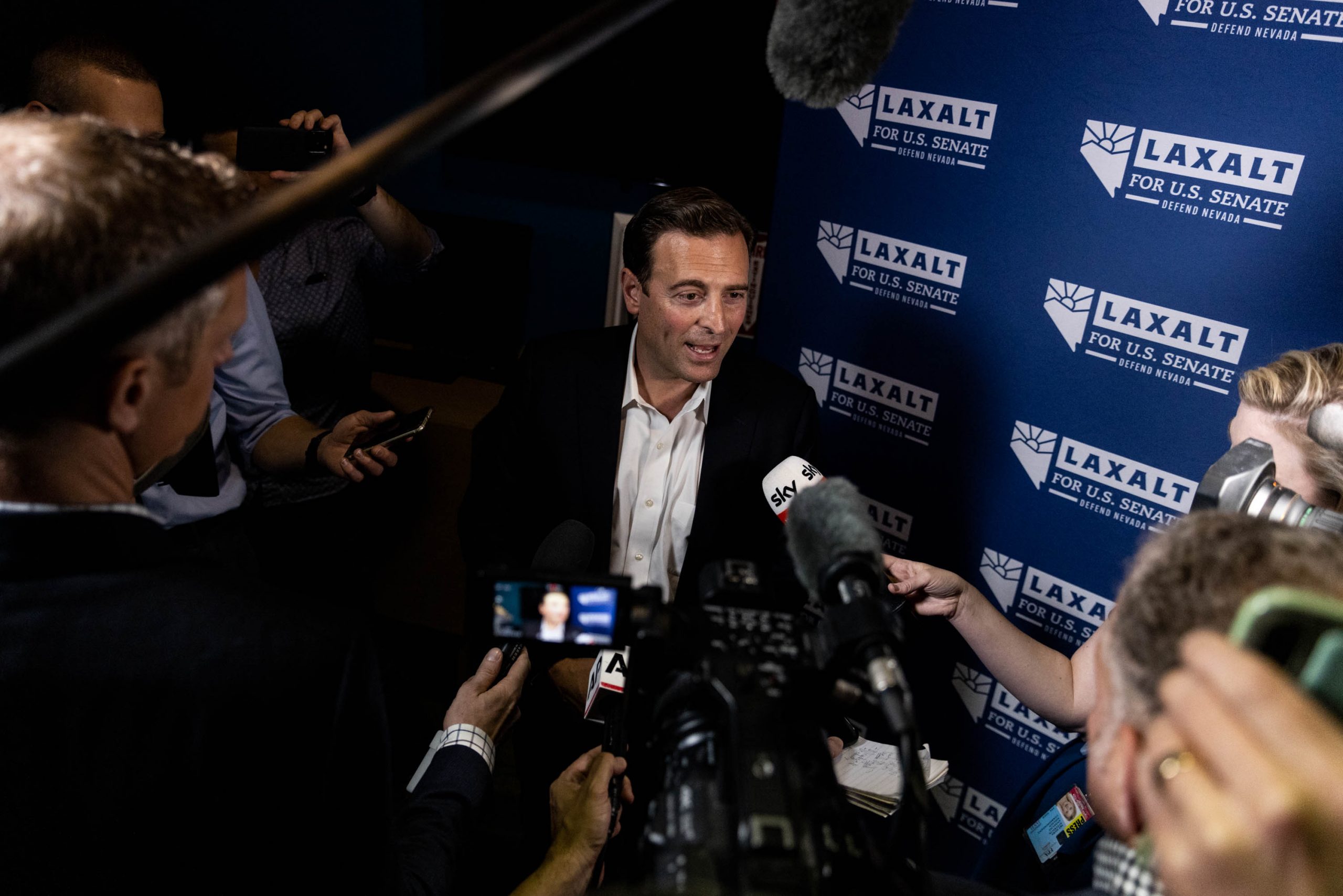 Nevada's Republican senatorial nominee, Adam Laxalt, takes questions from media at a Latino outreach event in Las Vegas, Nevada, Thursday, Oct. 20, 2022 