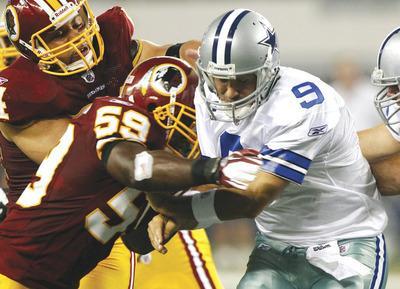 LM Otero/AP
London Fletcher and the defense kept Tony Romo and the Cowboys out of the end zone, but that was not enough in a Redskins loss.