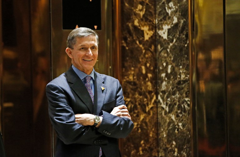 Last year, retired Lt. Gen. Michael Flynn tweeted out a fake news story that accused Hillary Clinton of being involved in sex crimes with children. He later deleted the tweet. (AP Photo/Kathy Willens)