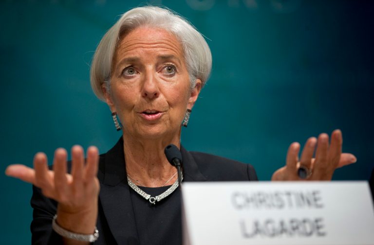 FILE - In this June 16, 2014 file photo, International Monetary Fund (IMF) Managing Director Christine Lagarde speaks during a news conference at IMF headquarters in Washington. The International Monetary Fund on Tuesday, Oct. 7, 2014, slightly lowered its outlook for global economic growth this year and next, mostly because of weaker expansions in Japan, Latin America and Europe. (AP Photo/Pablo Martinez Monsivais, File)