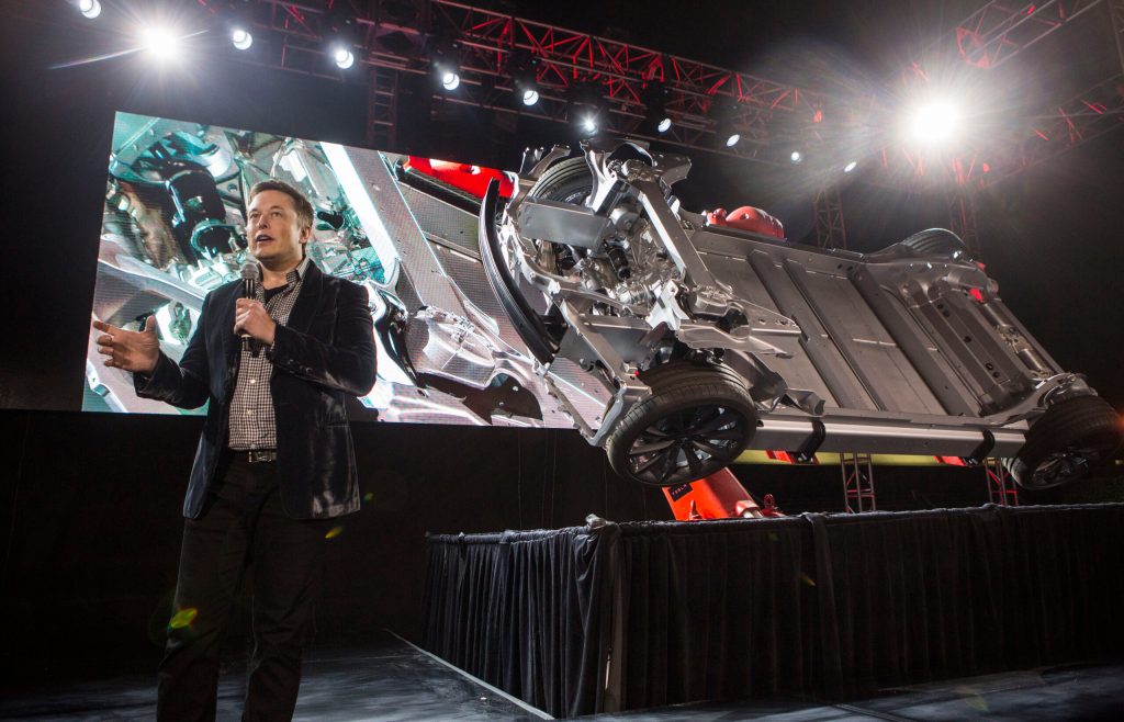 Tesla’s ‘D’ adds all-wheel drive, safety features