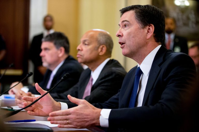FBI Director James Comey, right, andÂ Homeland Security Secretary Jeh Johnson, center, testified before the House Homeland Security Committee onÂ Wednesday. (AP Photo/Andrew Harnik)