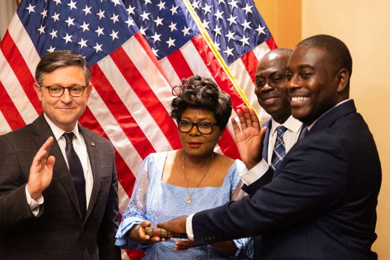 Rep. Gabe Amo (D-RI) is sworn in to the House by Speaker Mike Johnson (R-LA) on Nov. 13, 2023.